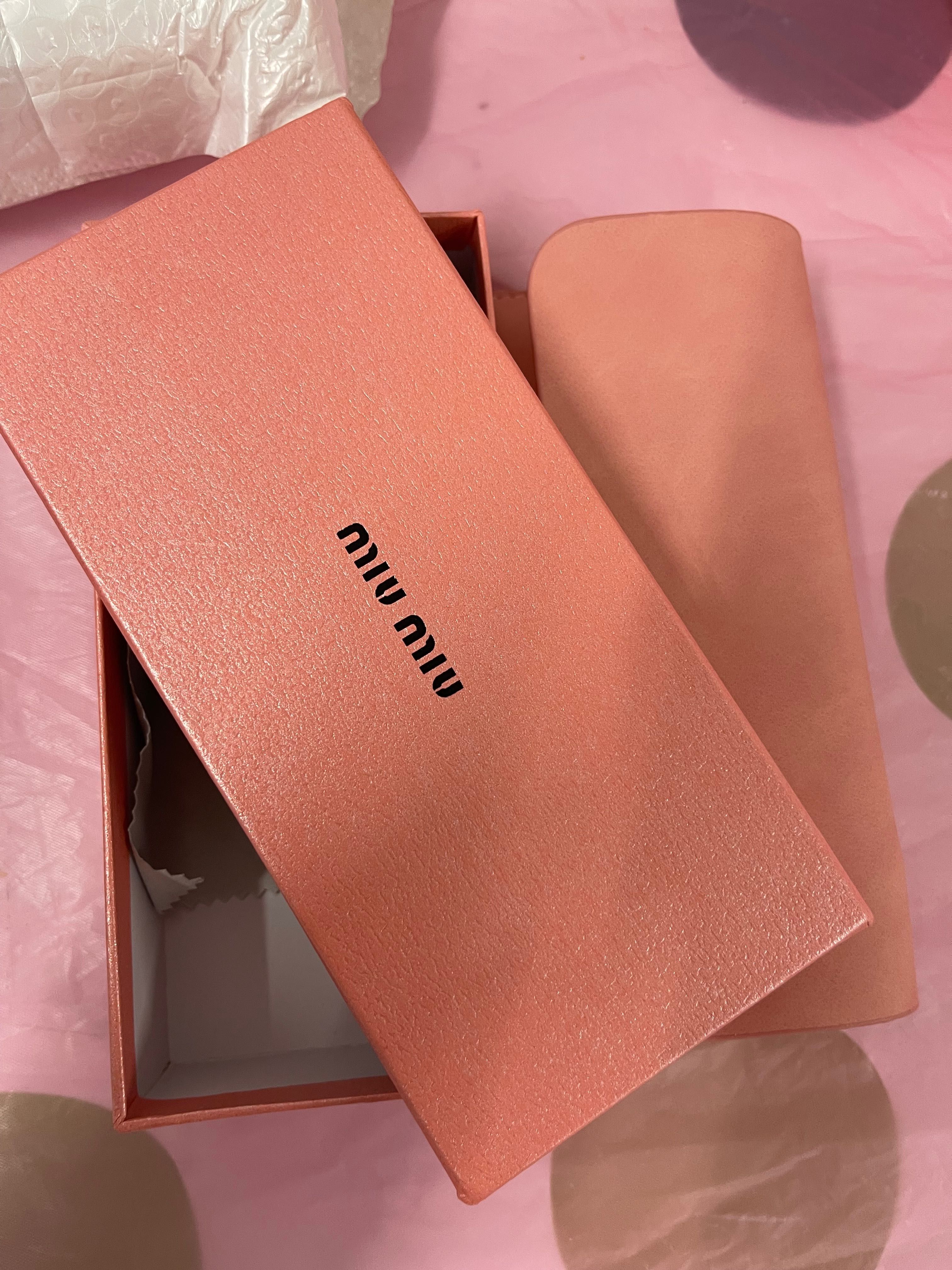 Óculos de sol miu miu