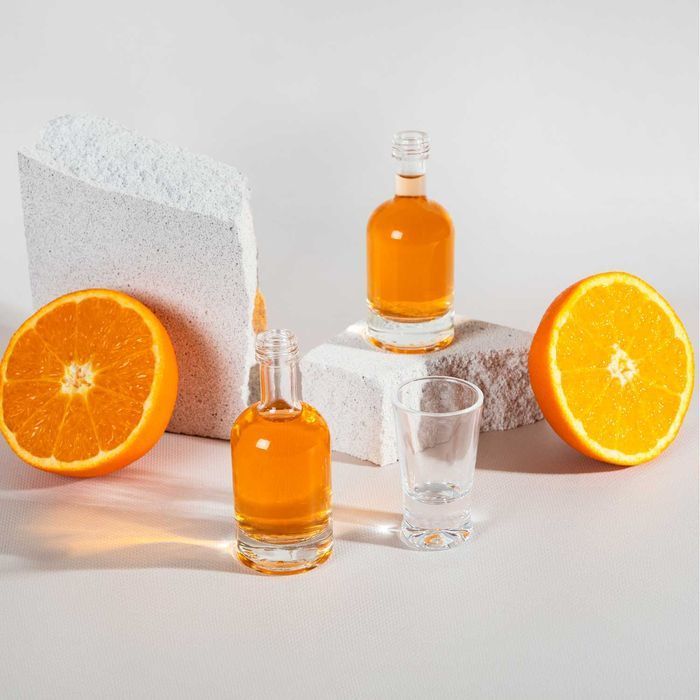 Zestaw 100x Butelka szklana TADEK 50ml na nalewki oliwę soki +zakrętki