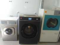Máquina de lavar roupa industrial de ocasião