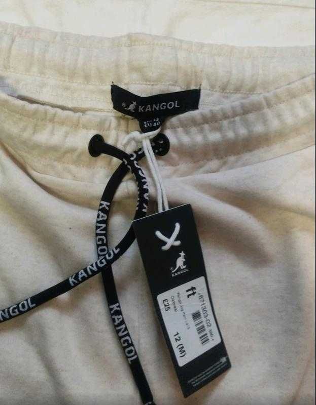 Светлый фирменный спортивный костюм Kangol