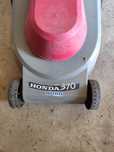 Corta relvas eléctrico marca Honda