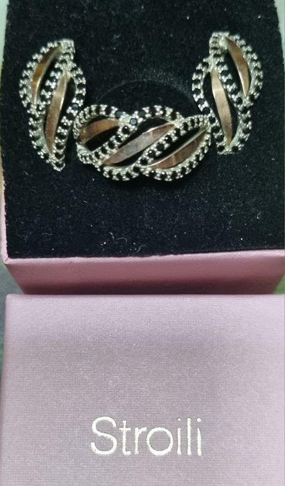 Продам новый набор серьги кольцо серебро  золото 375