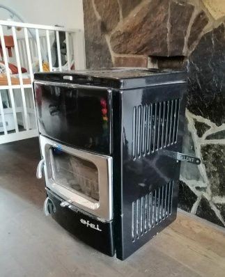 Piec, kominek  żeliwny z fajerką. Vintage