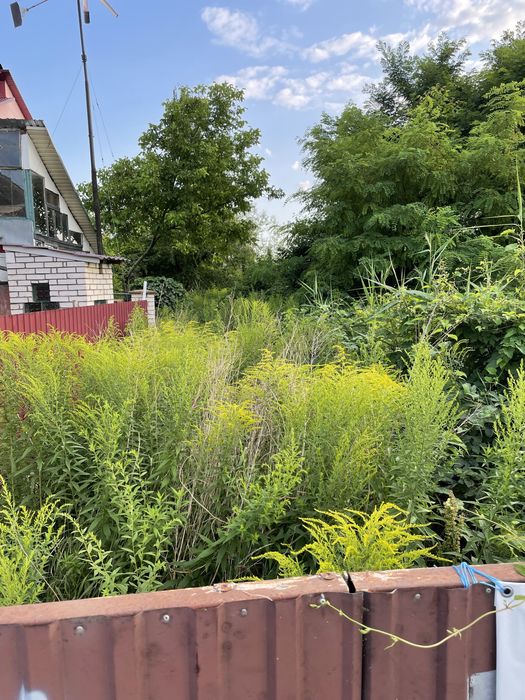 Земля на Подільській