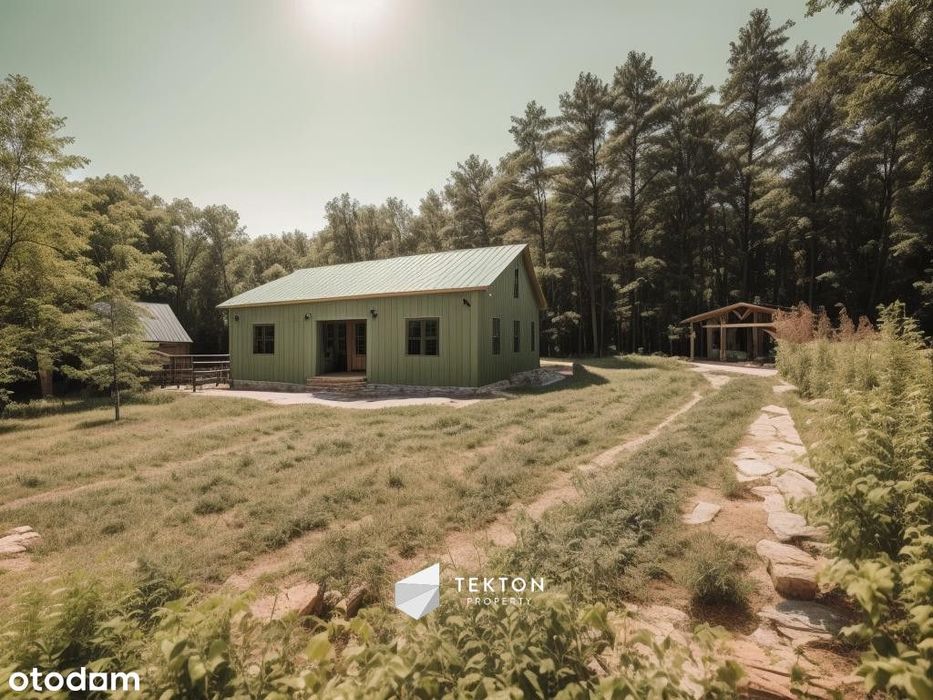 Nowy dom otulony lasem i jeziorami. Azyl
