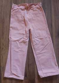 Dziecięce spodnie jeansowe różowe 116