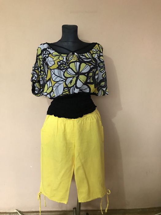 Komplet żóto- czarny nluxka i spodenki Moda Grinta roz. M