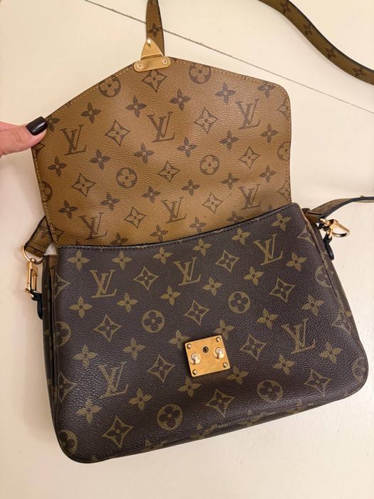 Сумка шкіряна в лого в ідеальному стані