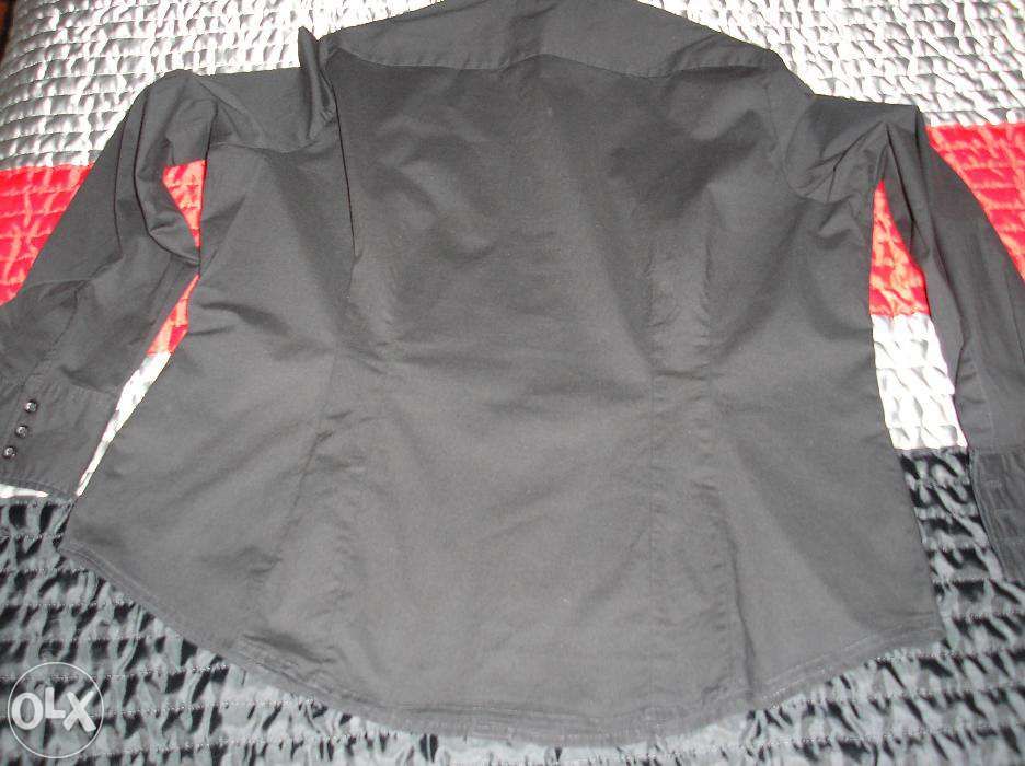 2 Camisas "Novas ",loja C&A.