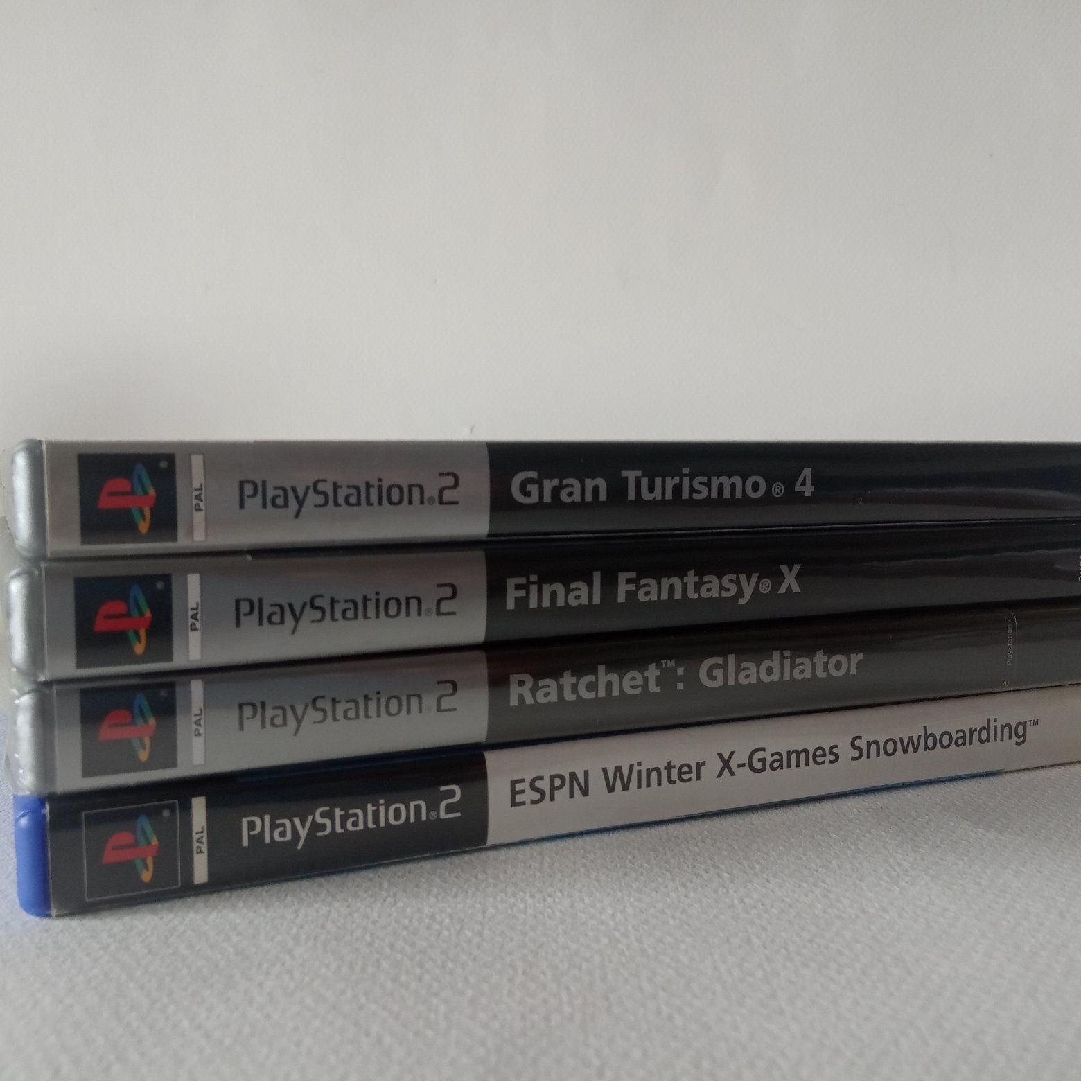 PlayStation 2 + 4 jogos