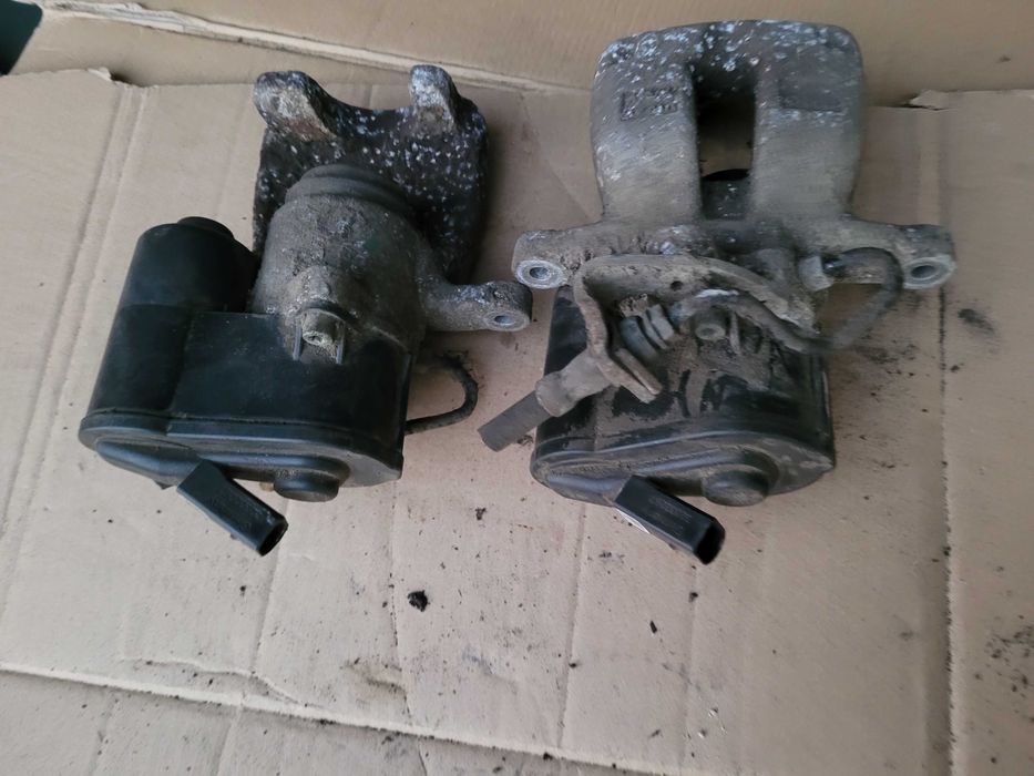 Zacisk hamulcowy elektryczny prawy tył tylny PASSAT B6 B7