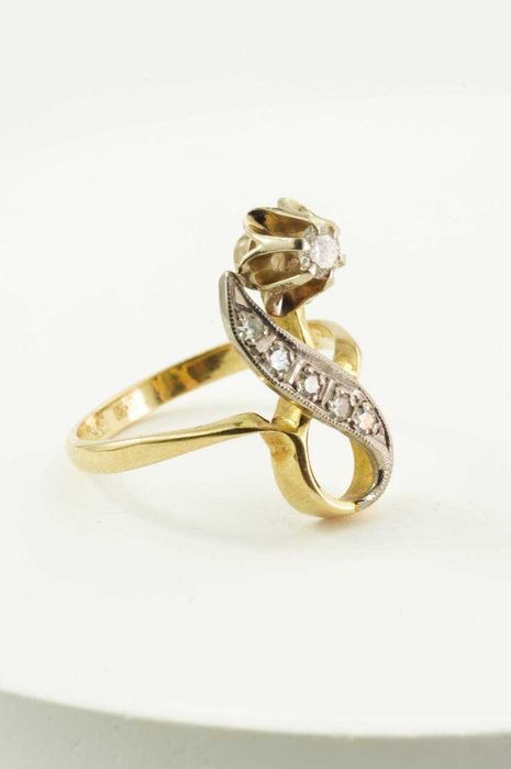 Złoty pierścionek 14K z brylantem 4.48g