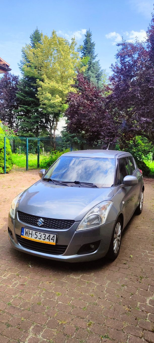 Suzuki Swift Autentyczny mały przebieg, dwa komplety nowych opon, "Krown"