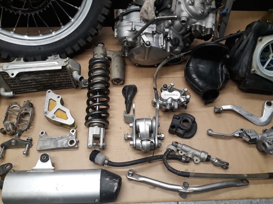 kawasaki kx 80 85 kartery skrzynia pokrywa wal glowica zawor mocy kosz