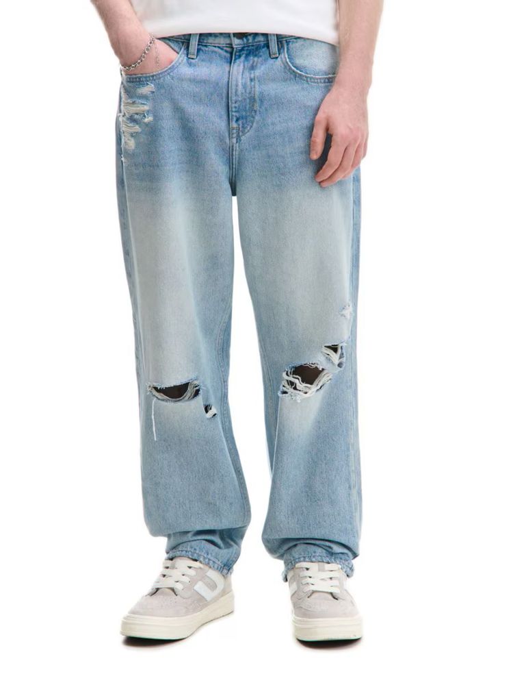 Spodnie jeansowe z dziurami przetarciami denimowe jeansy baggy Cropp