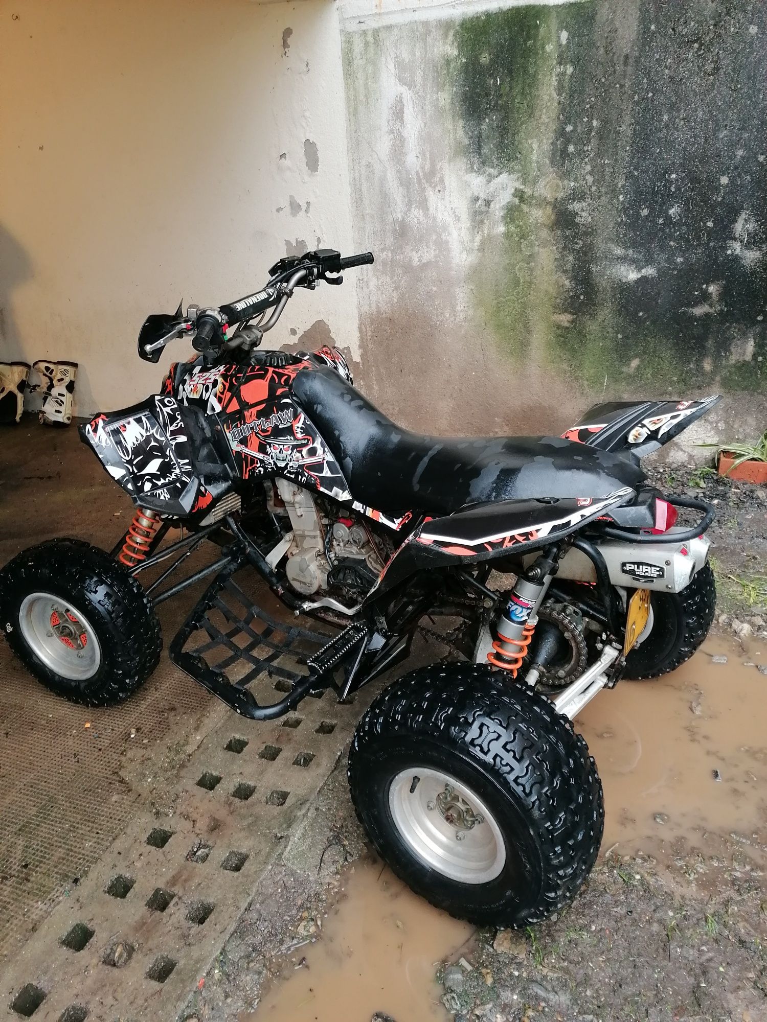 Vendo ou troco Polaris outlaw 525