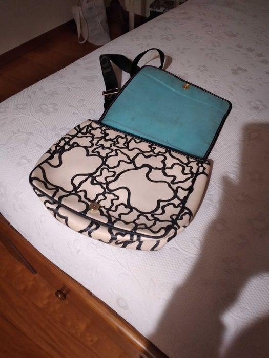 Mala Tous  semi nova