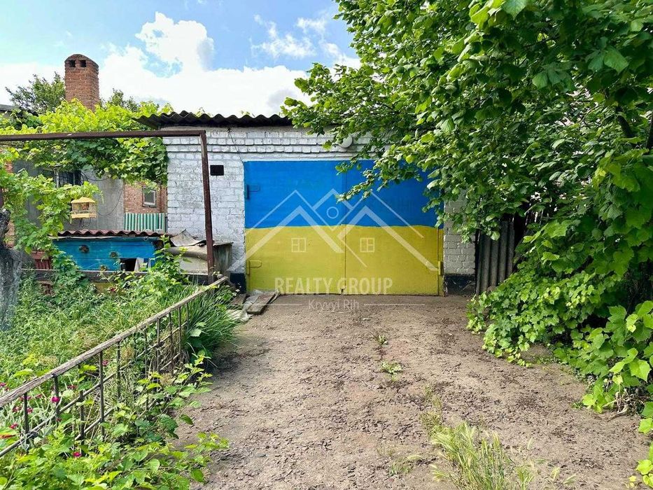 Продаж будинку з гаражем в Металургійному районі