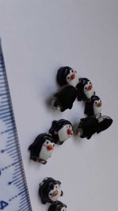 Pinguins em resina miniatura