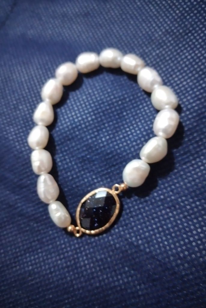 Pulseira de pérolas com prata