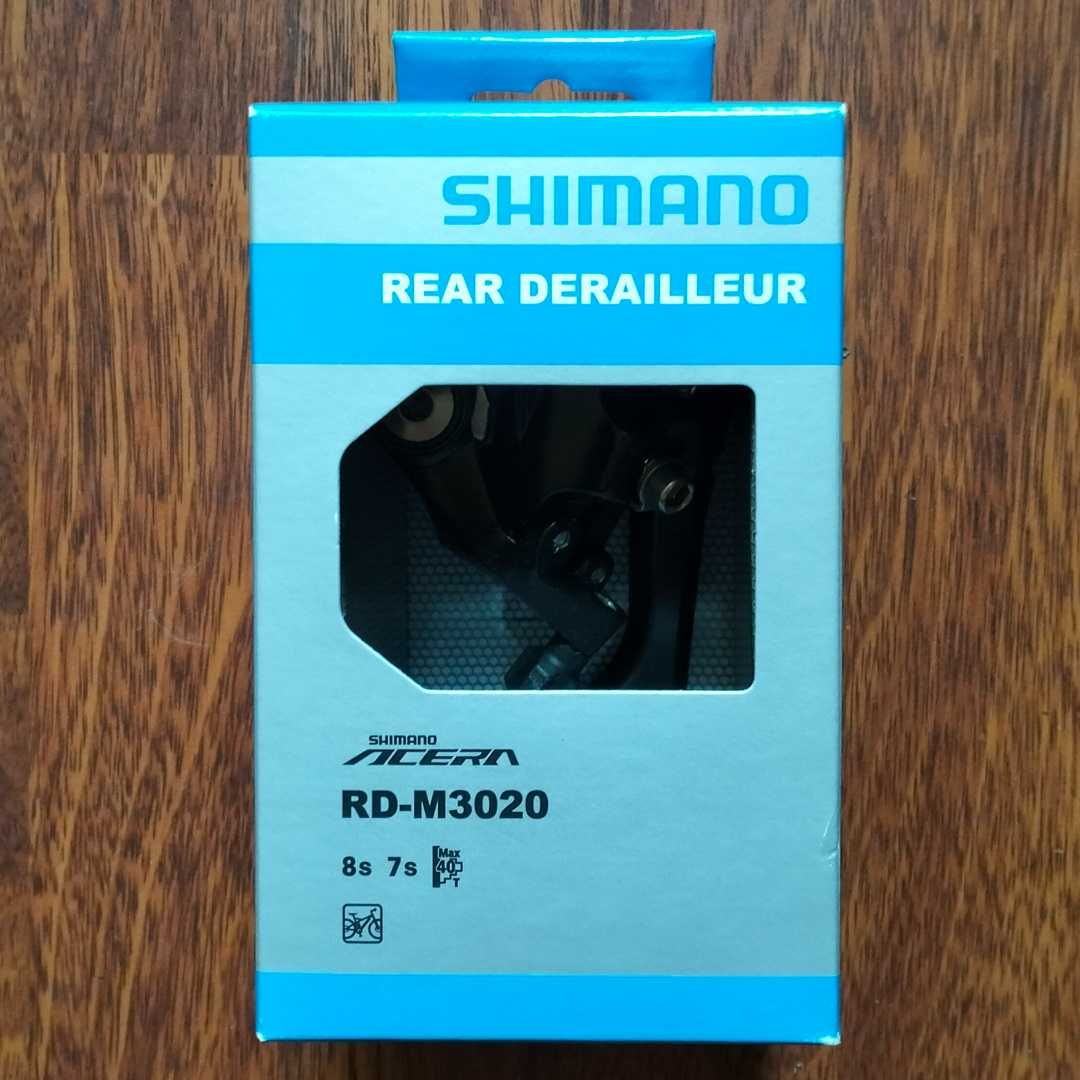 Задній перемикач Shimano Deore; SLX;(ХТ) 7--12 швидкостей