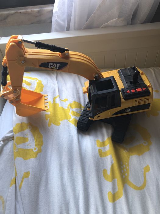 Escavadora CAT como nova.