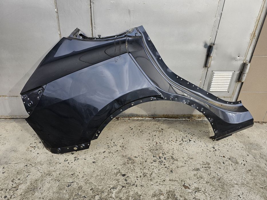 Заднє праве крило (фільонка) з "сапожком" Tesla model Y в колір PMNG