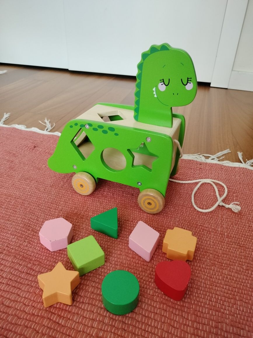 Carrinho dinossauro com peças puzzle de encaixe • brinquedo de madeir