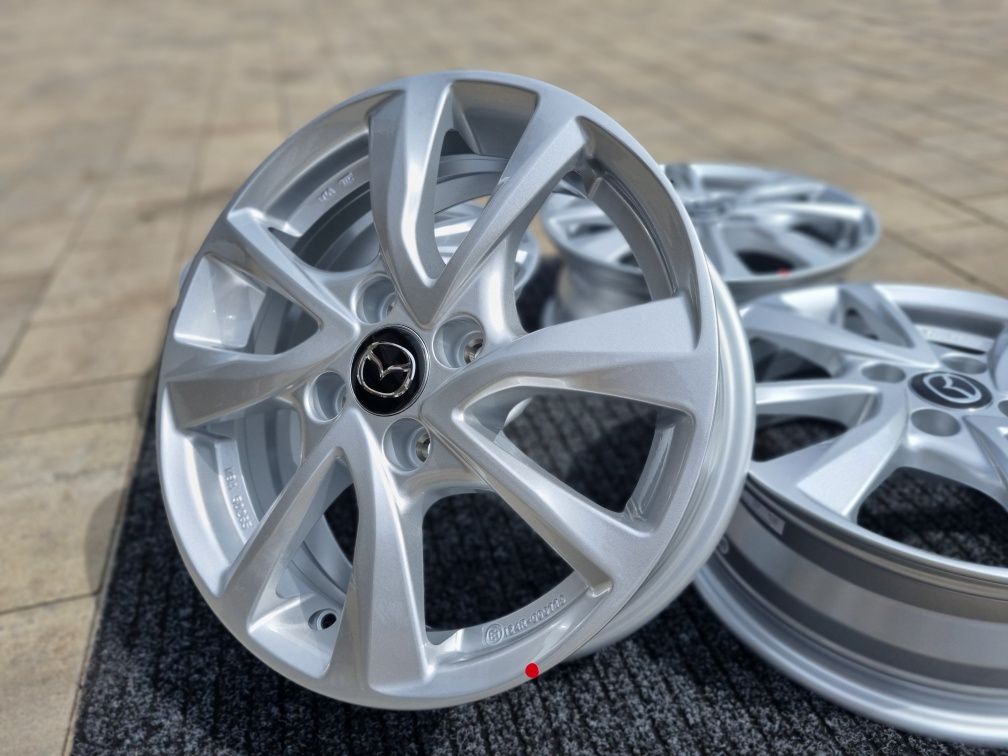 Mazda 2 felgi 15 " aluminiowe nowe 4x100 alufelgi Srebrne / Czarne