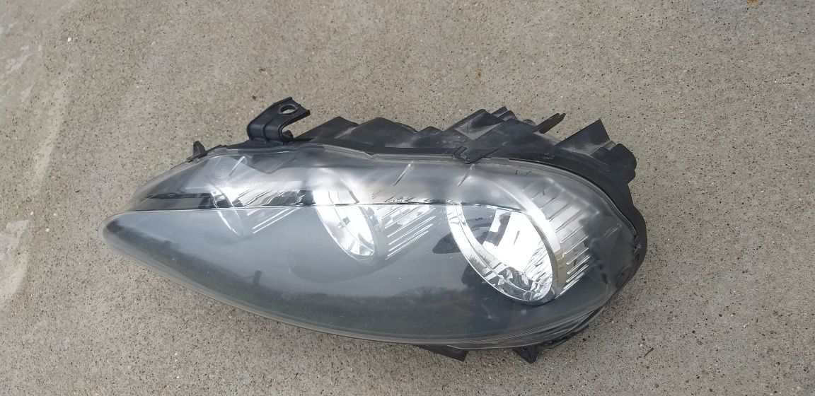 Alfa Romeo 147 lift lampa przednia lewa oryginał