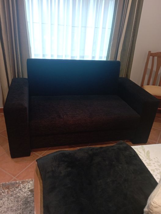 Sofá com almofadas removíveis