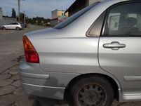 Suzuki Liana 1.6i 4D Sedan 2004r.Błotnik tylny prawy.