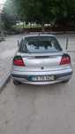 Opel Tigra ler a descrição com