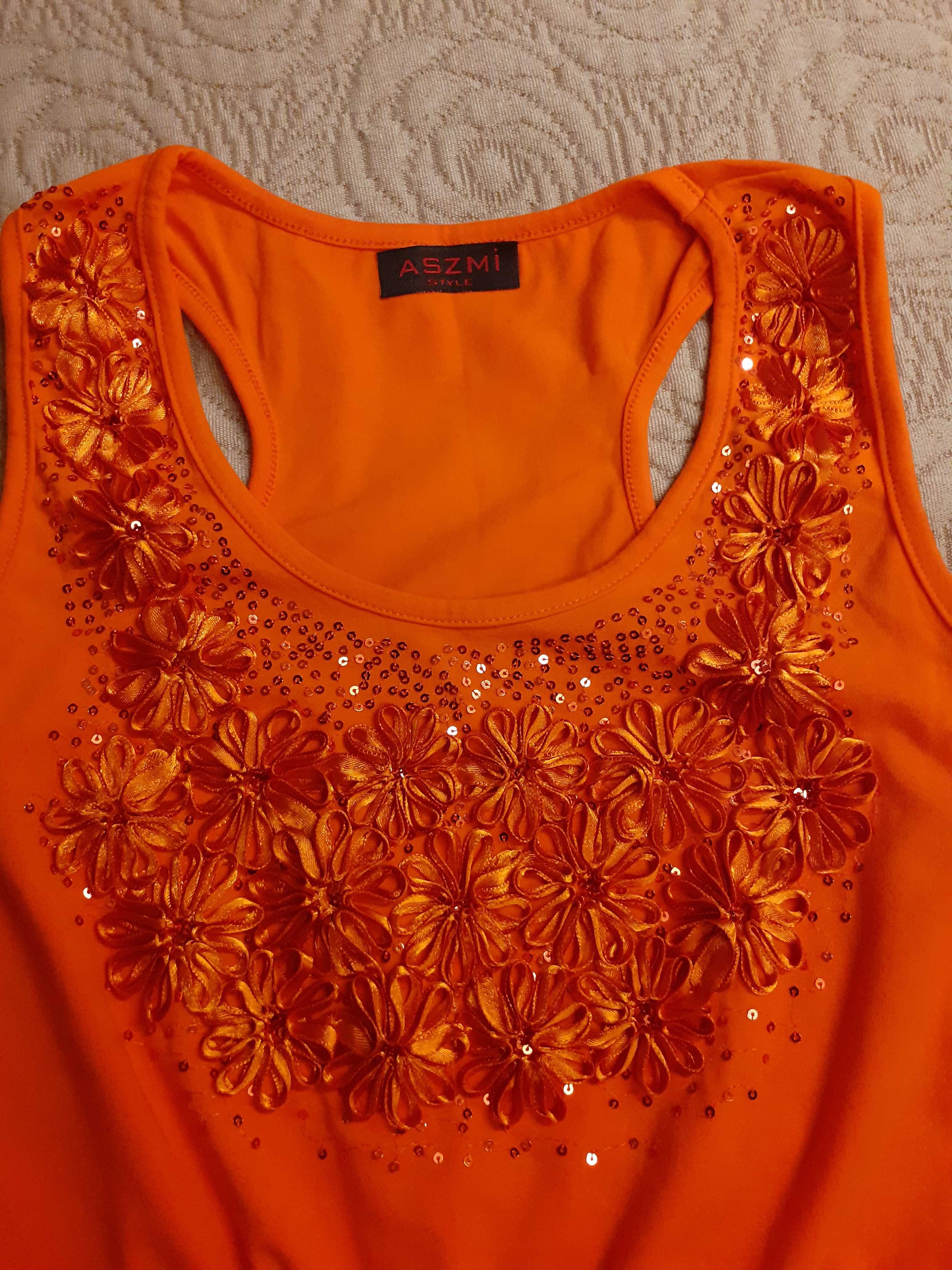 Pomarańczowa bluzka z ciekawym zdobieniem z miękkiej bawełny