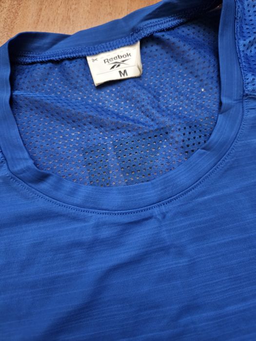 Продам футболку для бега , занятием спортом Reebok.