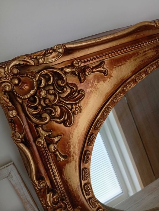 Lustro owalne z rama w kolorze miedzi