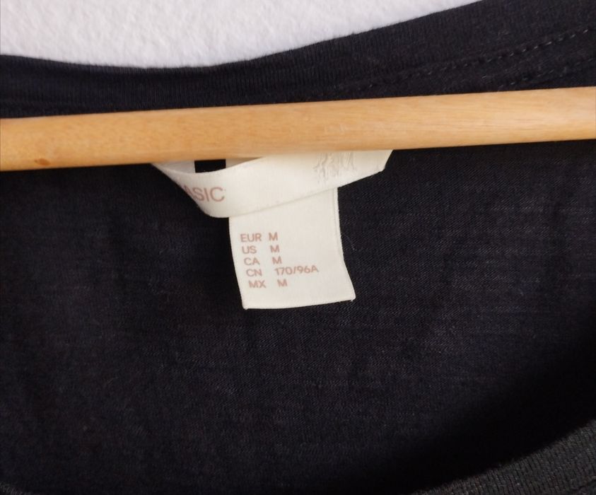 Krótka sukienka damska czarna L z gumką w talii z kieszeniami modna