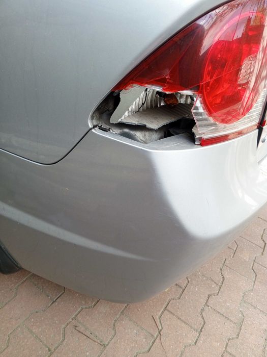 Оригинальный задний фонарь на Honda Civic 4D 8 (06-11)