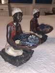 Par de figuras étnicas decorativas