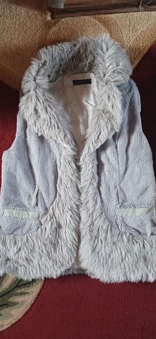 Теплі жилетки на дівчинку-підлітка