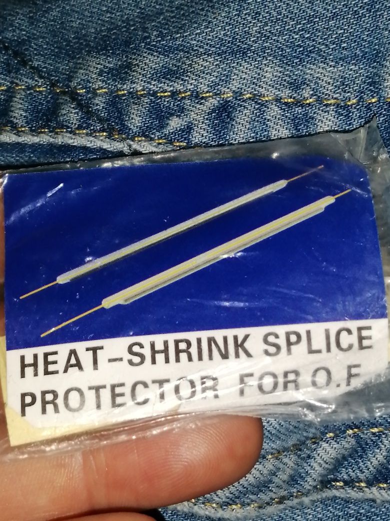 Heat shrink splice protector for O. F.