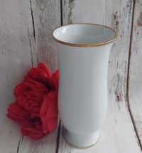 Kaiser elegancki biały wazon na stópce. Lśniąca biała porcelana, ranci