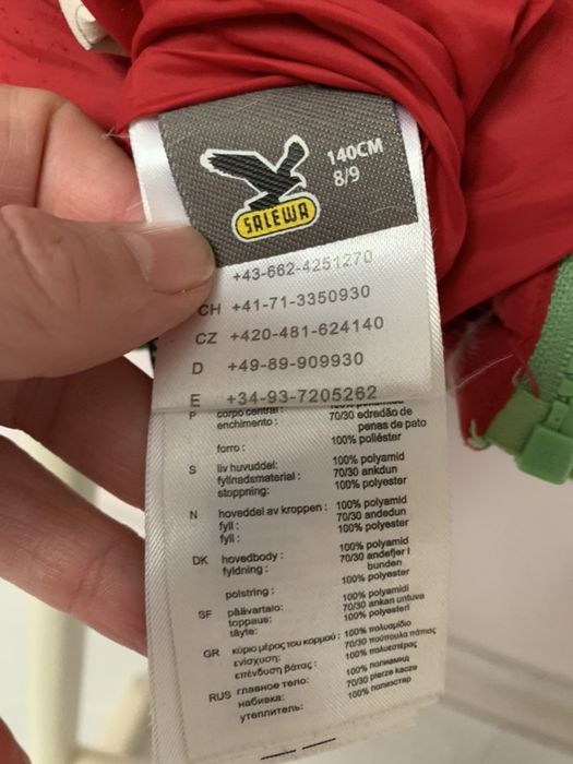 Salewa пуховик двухсторонний на 7-10 лет.