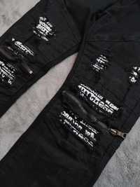 Elyn.g  jeans spodnie rurki czarne dziury napisy 32/46