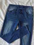 Bawełniane niebieskie spodnie joggersy denim H&M