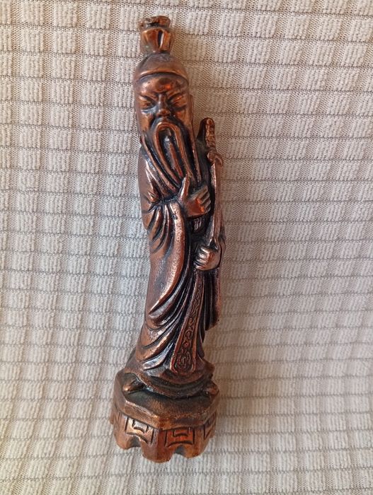 Figurka chińskiego mędrca.