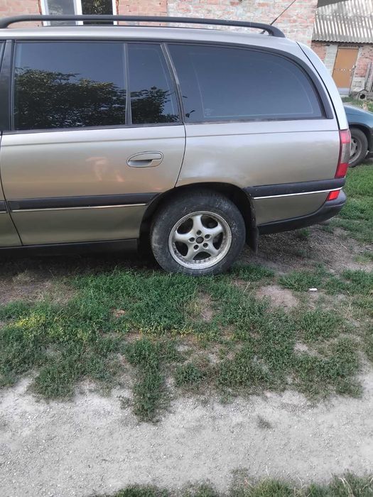 Opel Omega B,2,5 газ/бензин.