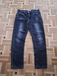 Reserved spodnie dżinsy miękkie 140