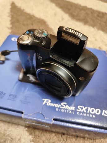 Canon SX100 IS фотоапарат