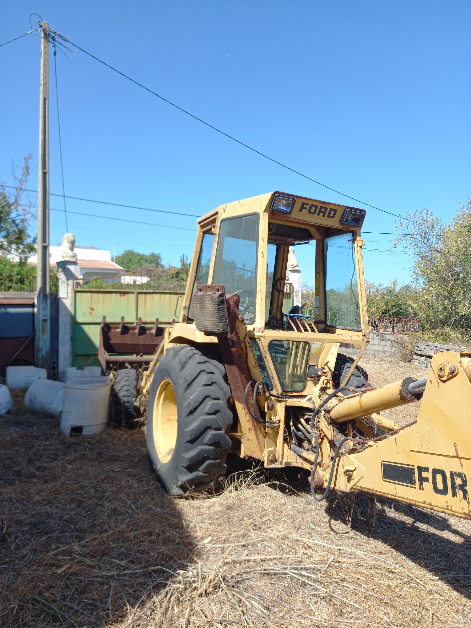 Three Ford Tractores